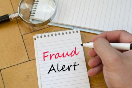 fraud-alert-notebook-compressed.jpeg